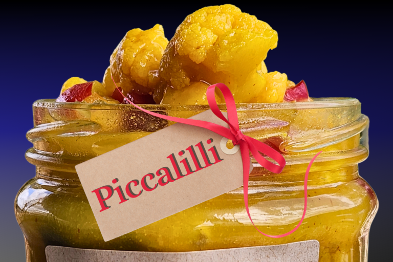 Homemade Golden Mustard Pickles (Piccalilli) in glass jars – a flavourful, tangy, and slightly sweet mustard pickle perfect for sandwiches and cold meats.
