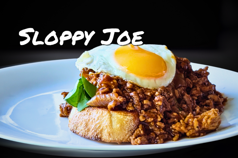 Sloppy Joe Recipe – A hearty and delicious comfort food with beef and pork mince in a rich, flavourful sauce, served on buttered bread with cheese and a fried egg.