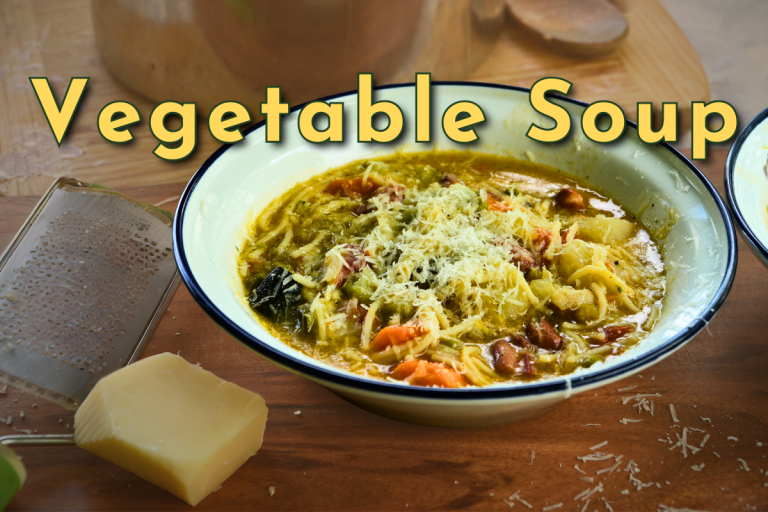 A bowl of vibrant vegetable soup topped with basil pistou and grated Parmesan, filled with chunky vegetables and pasta.