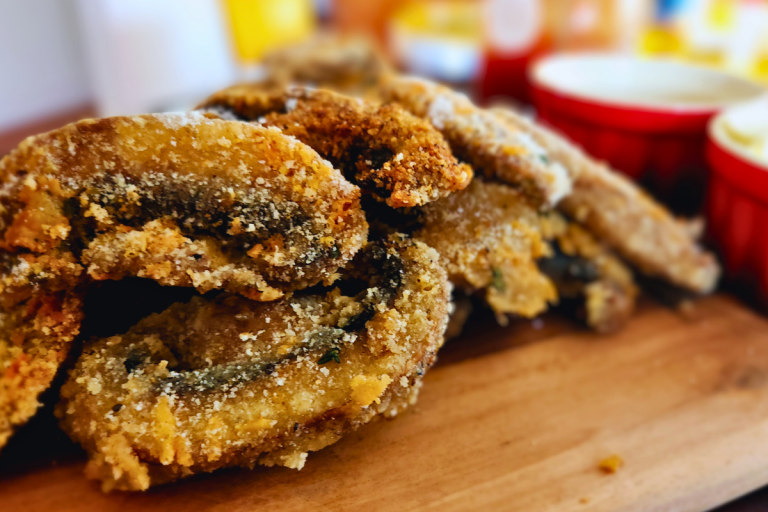 Crumbed mushrooms with golden, crispy coating and flecks of parmesan and thyme