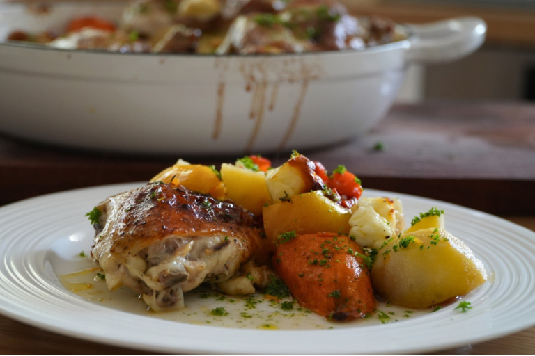 One pan chicken bake with roasted potatoes, sweet potato, capsicum and halloumi